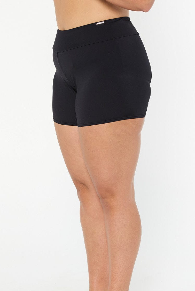 model showing side of black chlorine resistant boyleg swim pant