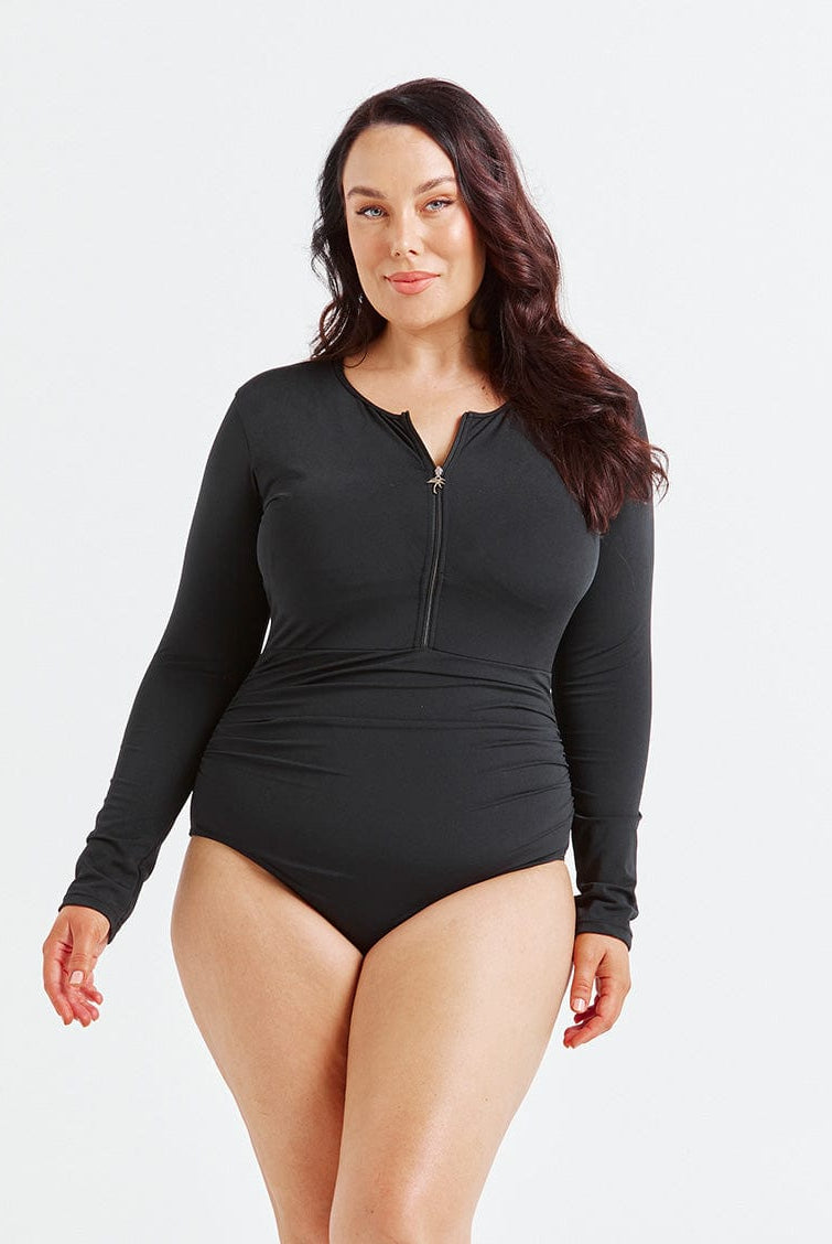 model wearing black long sleeve one piece
