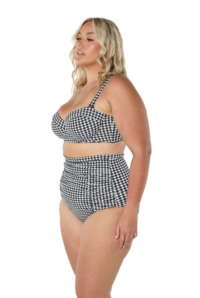 model wearing black and white print retro bikini