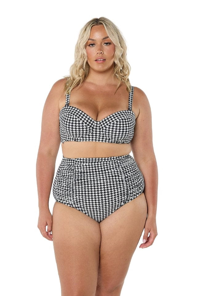 model wearing black and white hounds tooth bikini