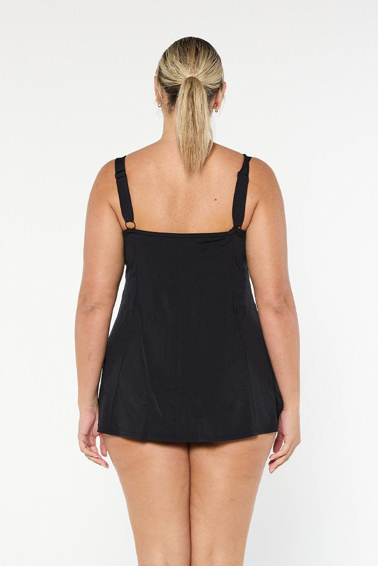 model wearing black chlorine resistant swim dress