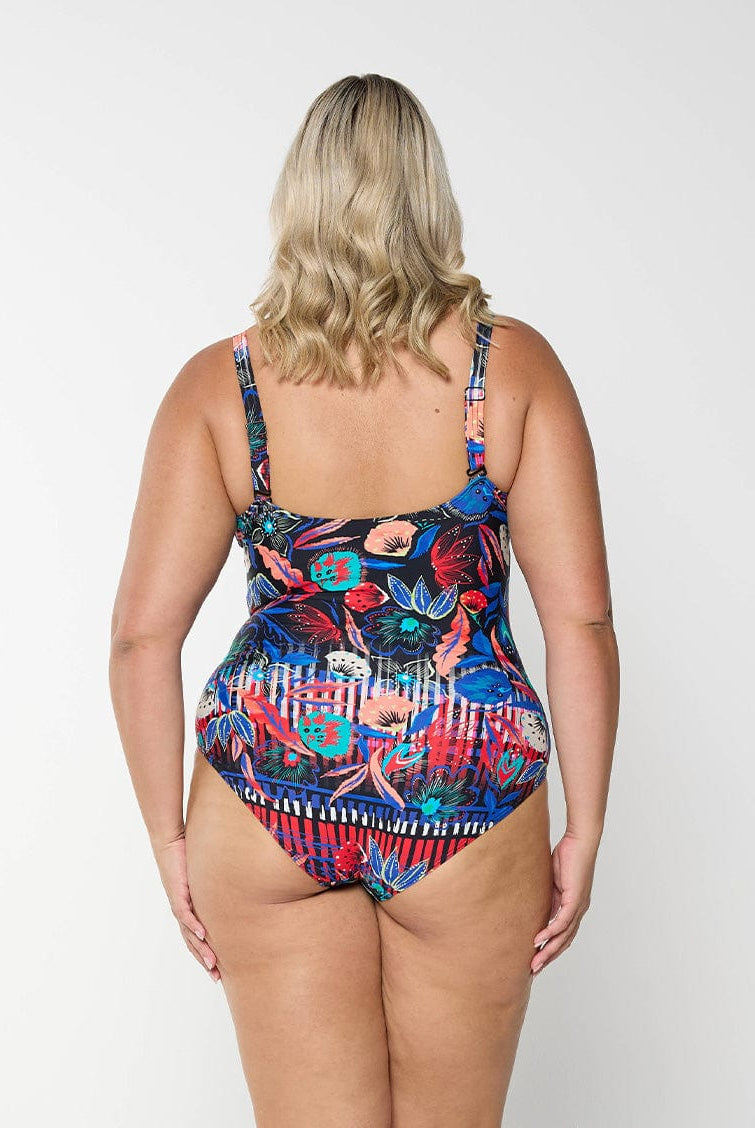 model showing back of bright coloured floral swimsuit