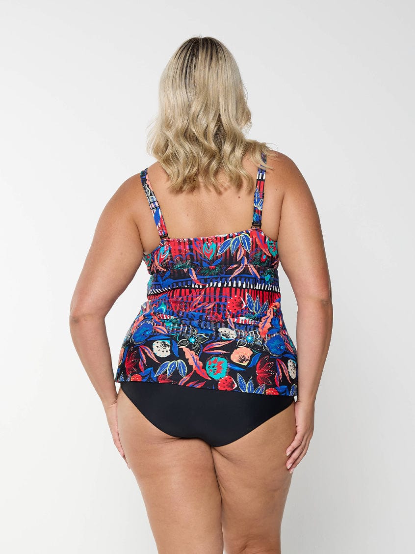 model showing back of bright colourful women's swim tankini top