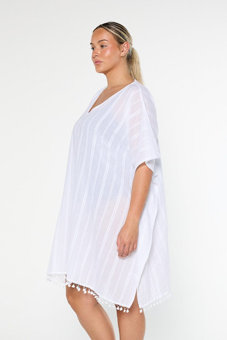 model showing side of white cotton kaftan