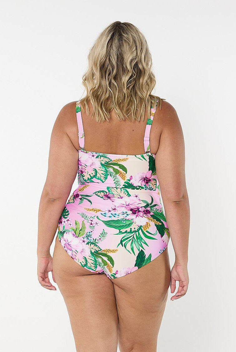 model showing back of pink floral women's swimsuit