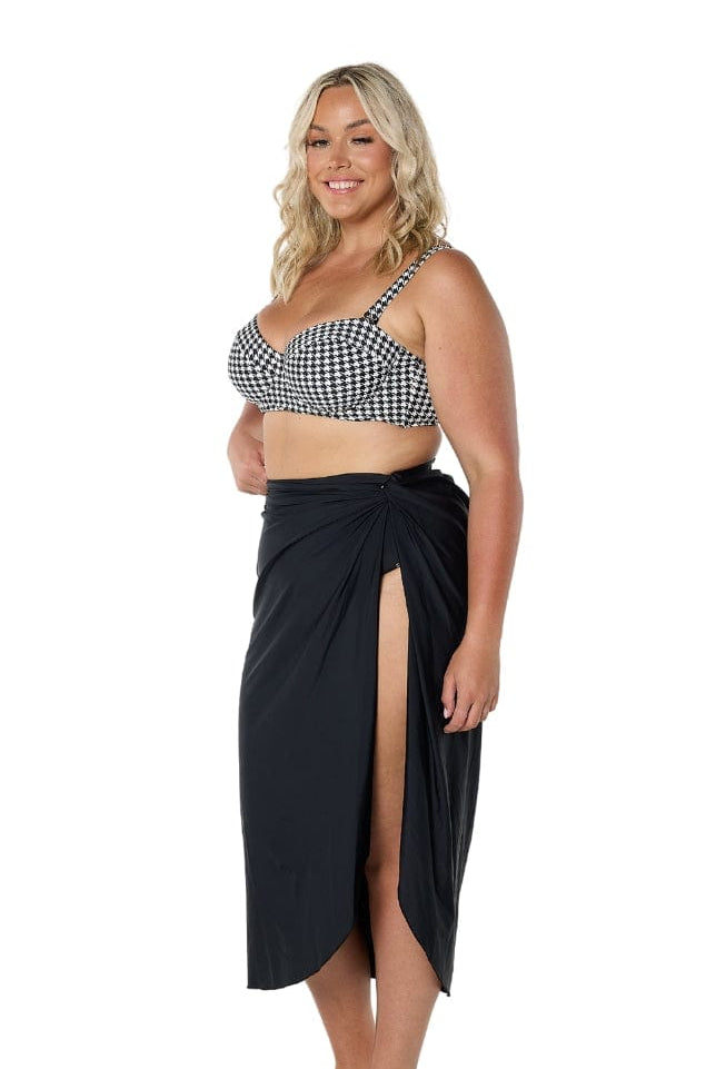 model showing side of black split skirt