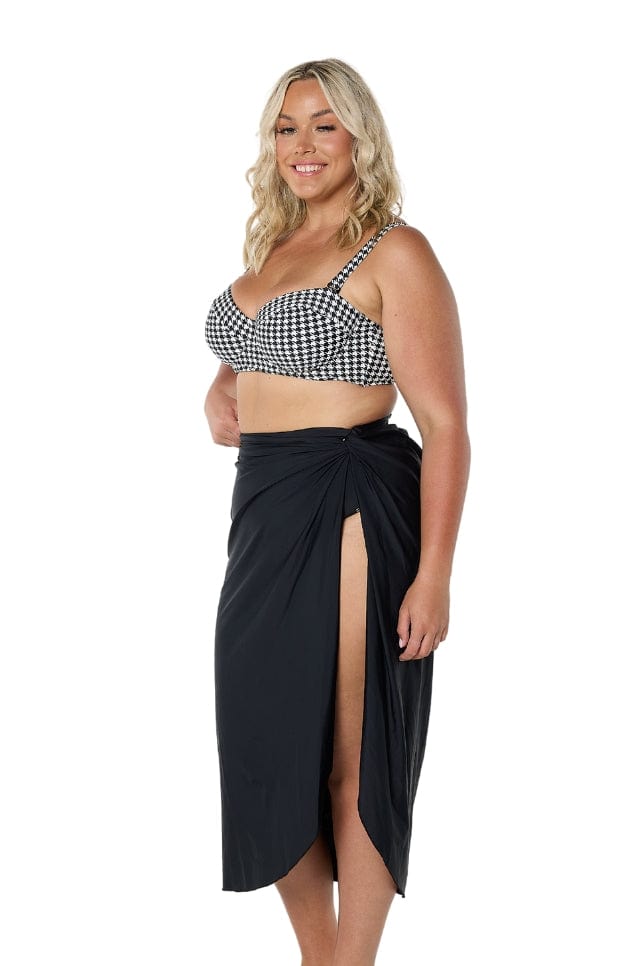 model showing side of black split skirt