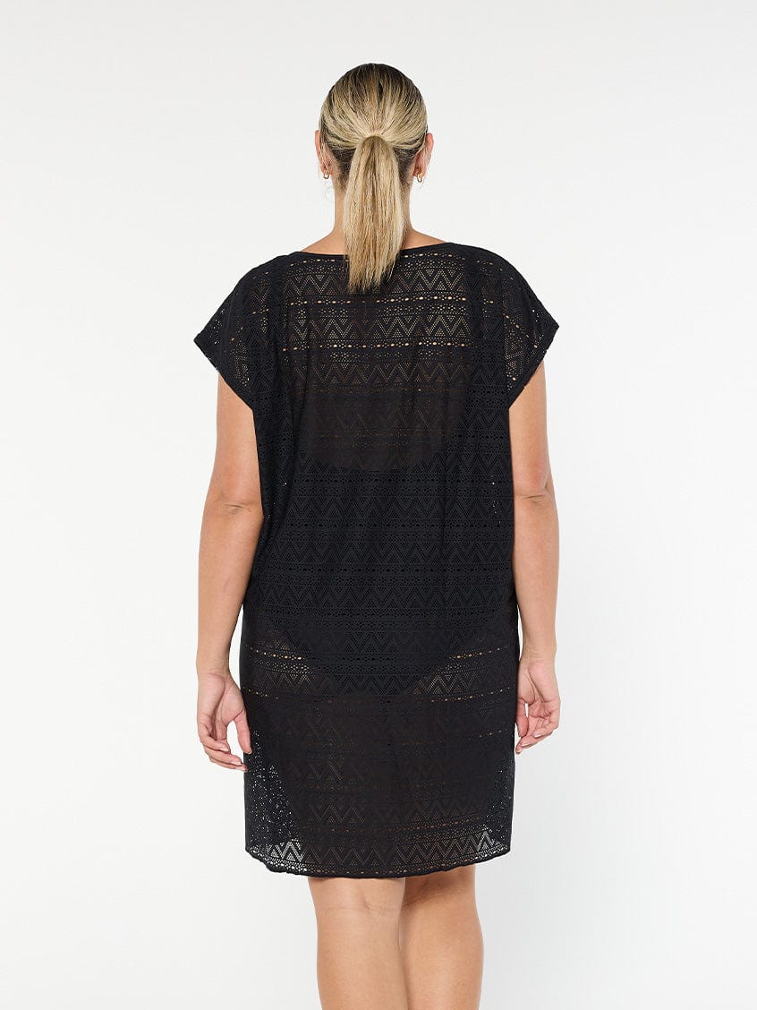 model showing back of black mesh beach cover up