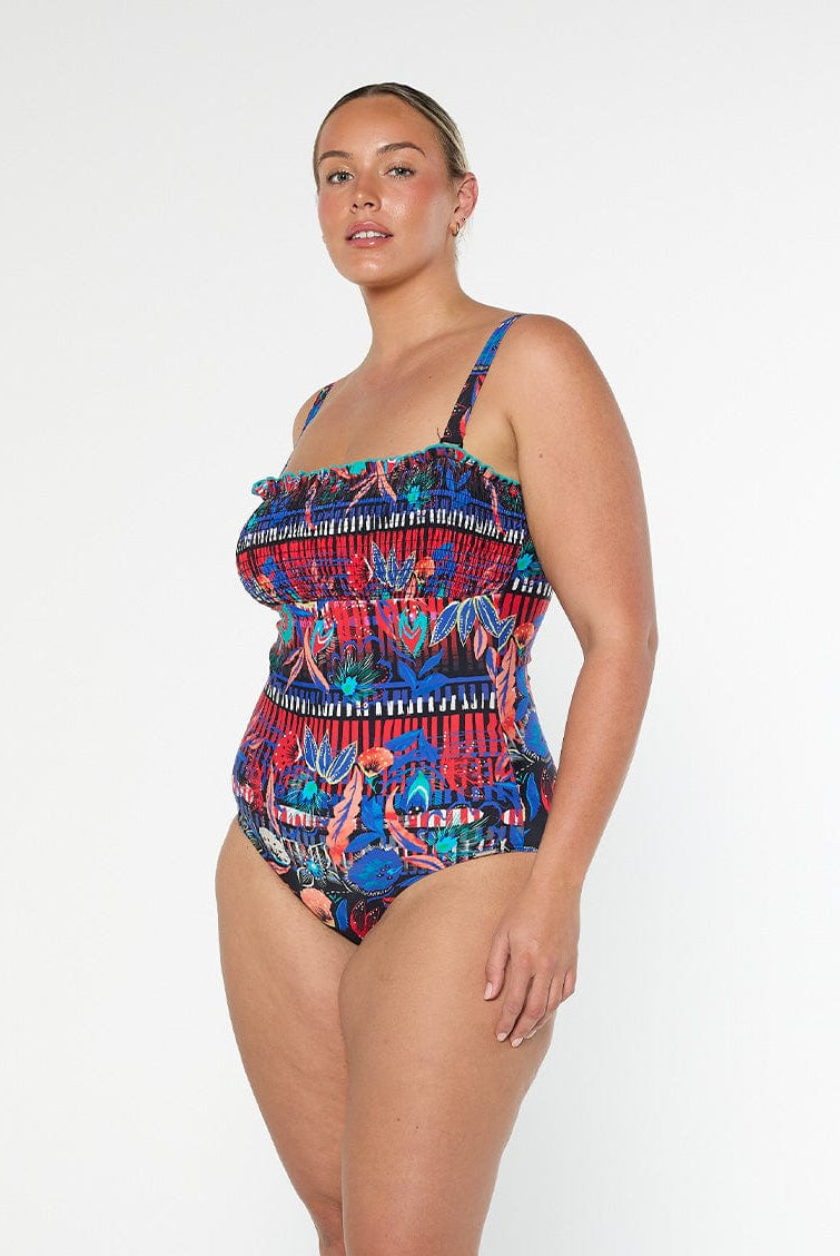 model showing side of vibrant women's one piece
