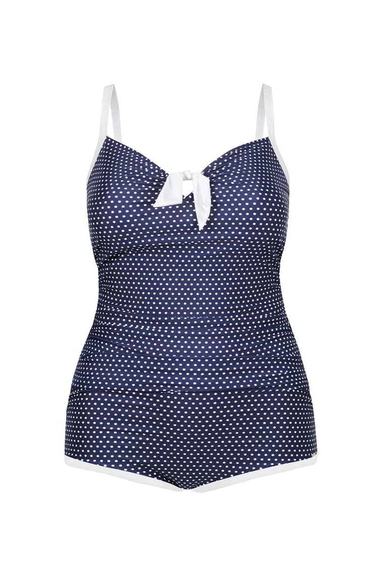 Navy blue swimsuit with white polka dots and trim