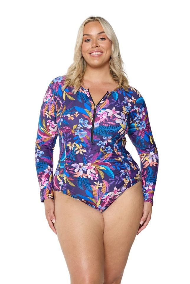model wearing navy floral long sleeve swimsuit