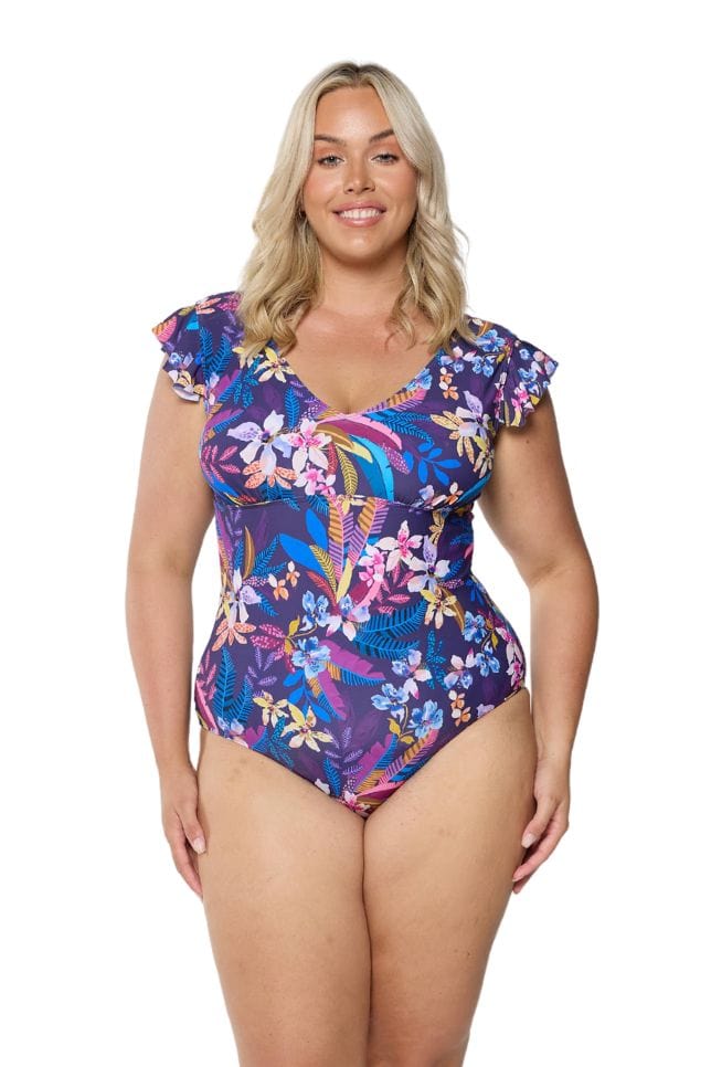 model wearing navy floral v neck swimsuit