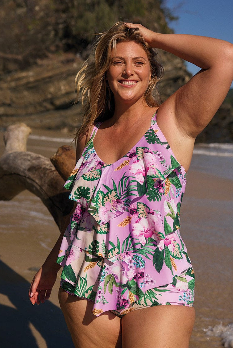 model wearing pink floral tankini top