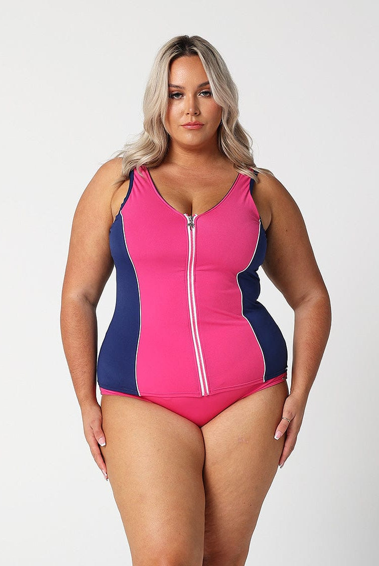 model wearing pink high waisted swim bottoms with matching tankini