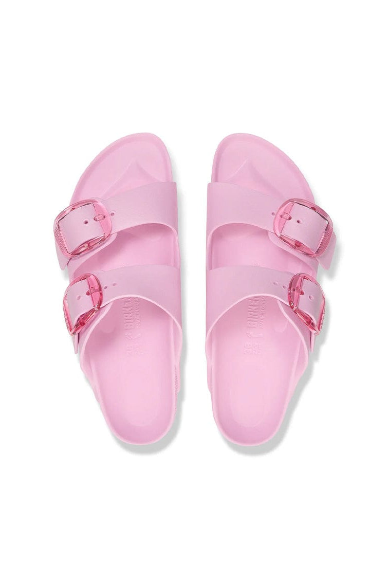 Pair of pink sandals with buckle straps