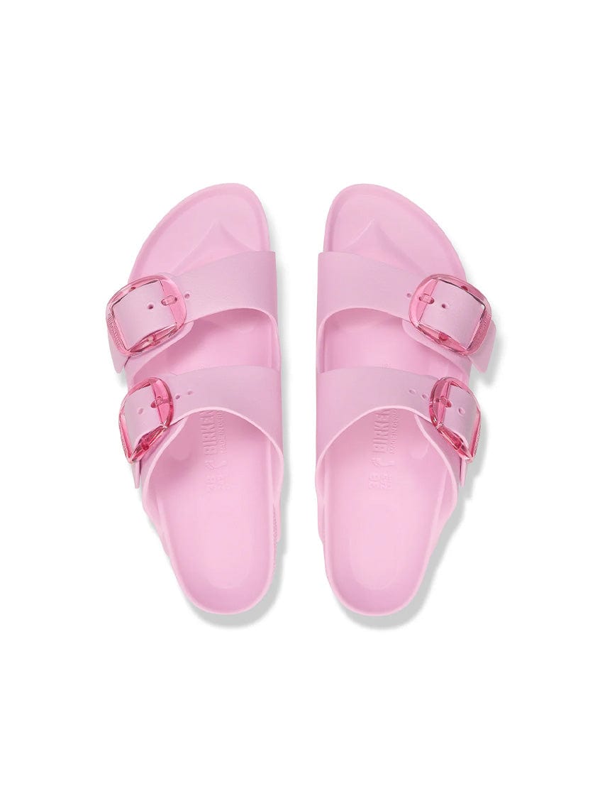Pair of pink sandals with buckle straps