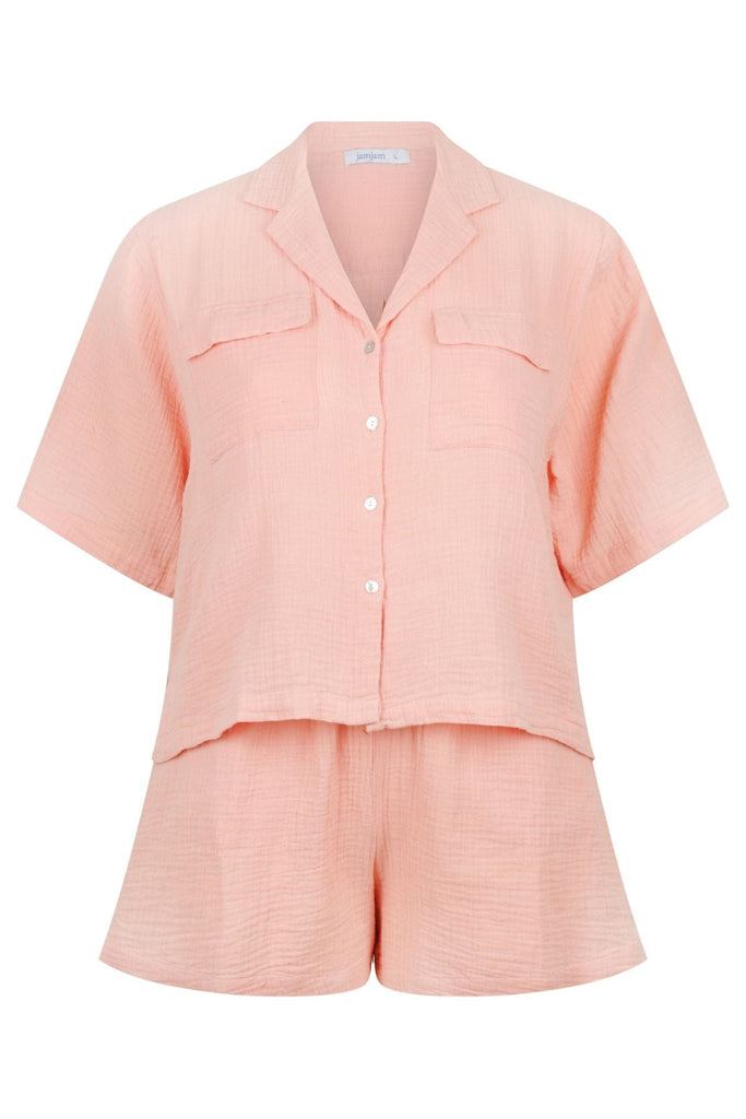 ghost mannequin of pale pink crepe cotton lounge wear set, short sleeve and button through with matching shorts