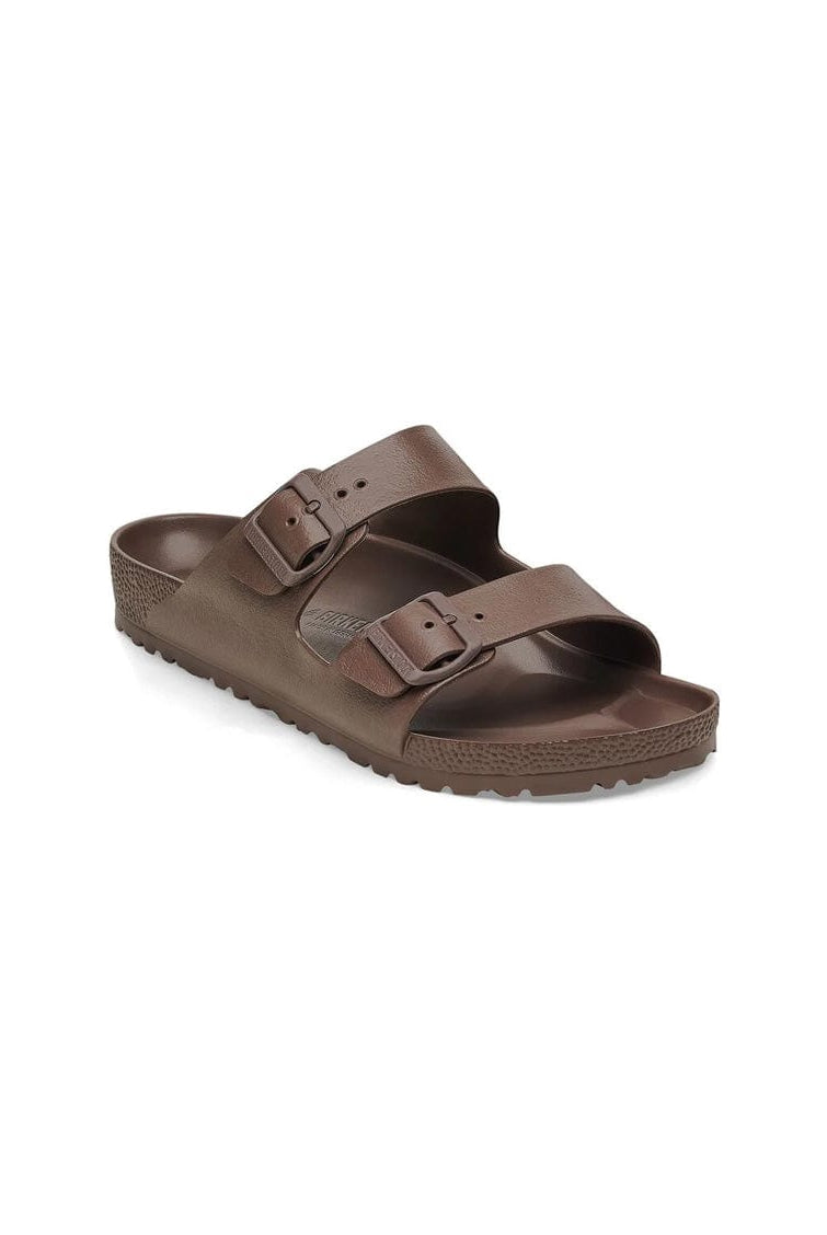 Brown sandal with two straps on a white background