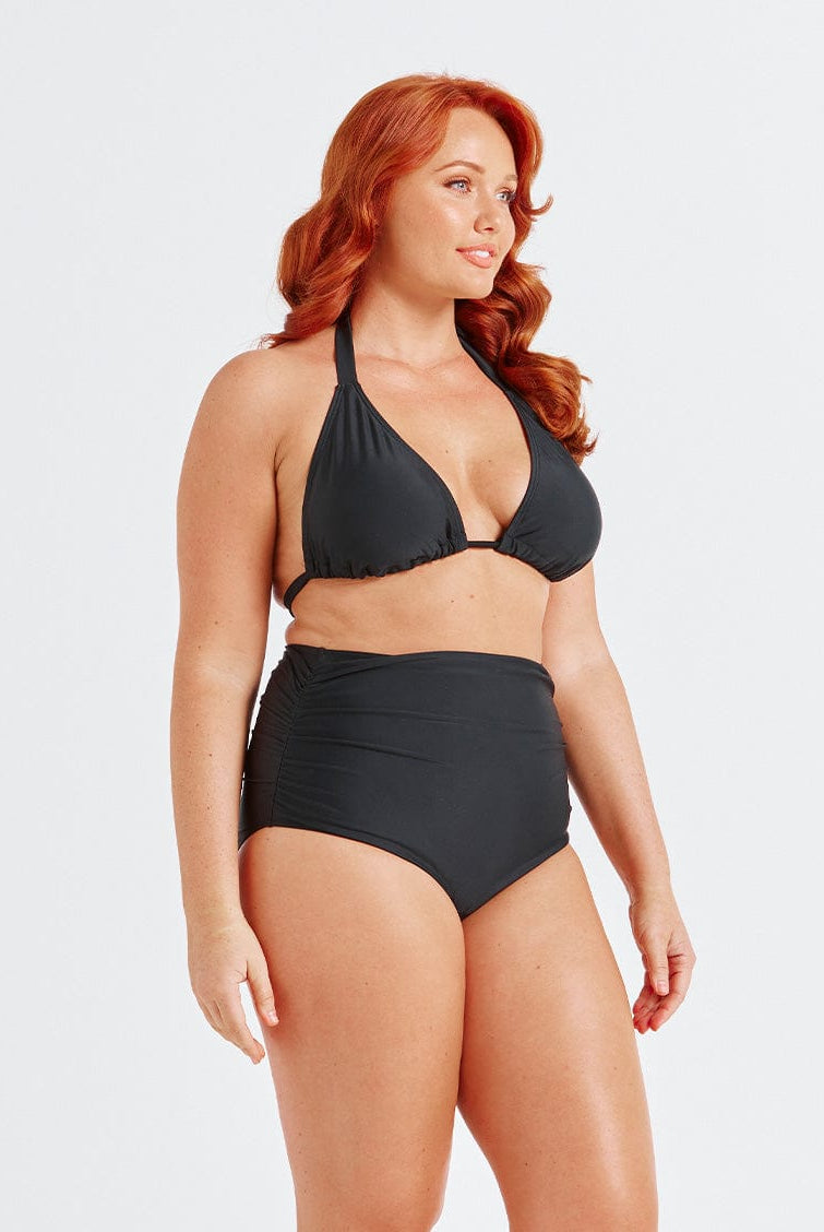 model showing side ruching on black swim bottom