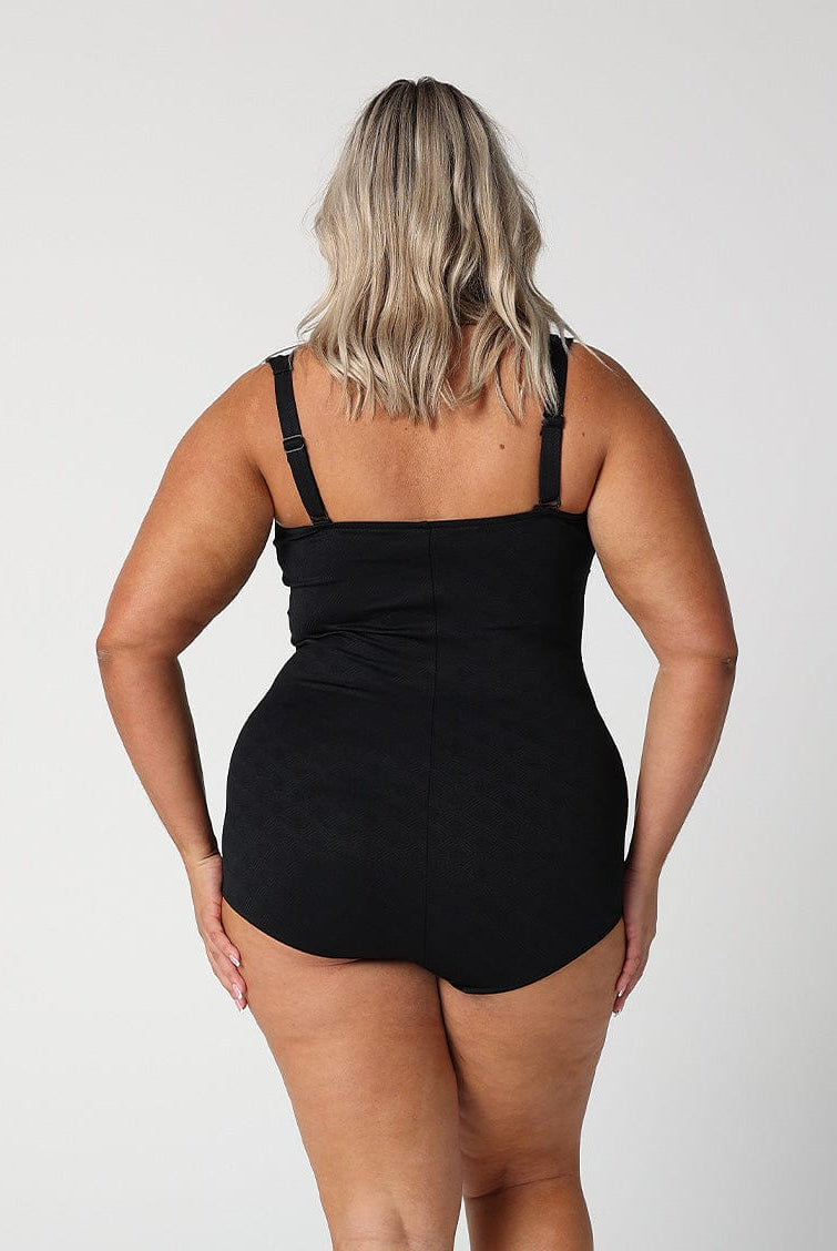model showing full coverage bottom of black women's one piece