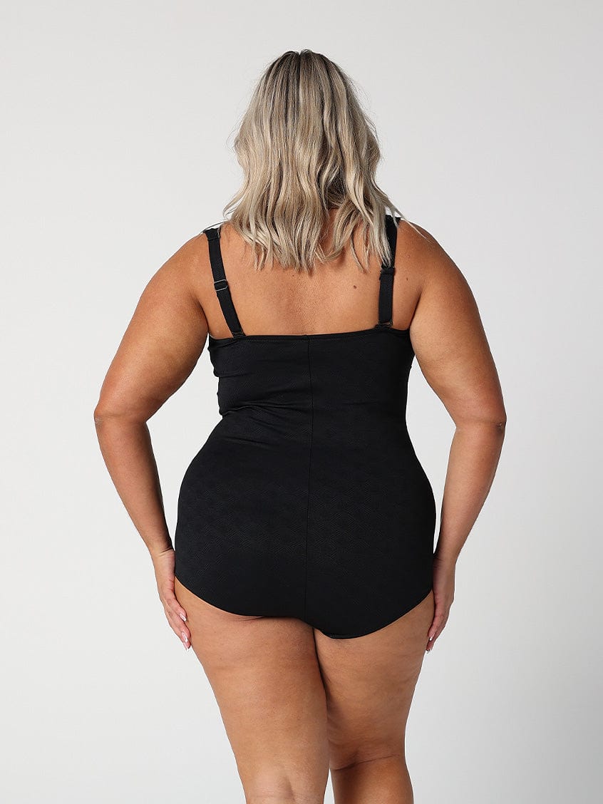 model showing full coverage bottom of black women's one piece