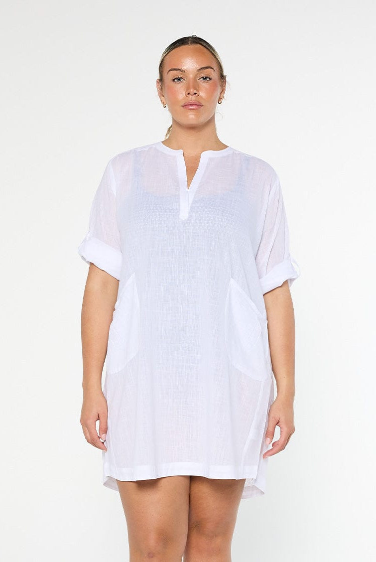 model wearing white over shirt dress