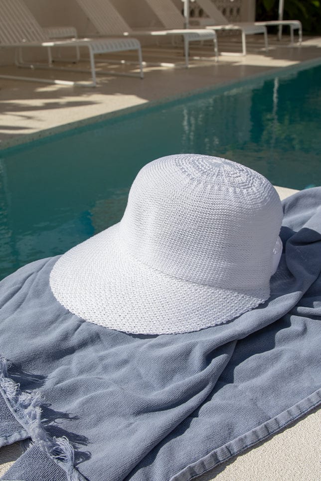 white wide brim hat