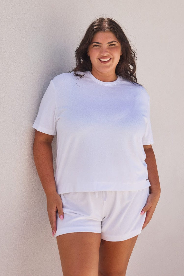 model wearing white terry towelling top