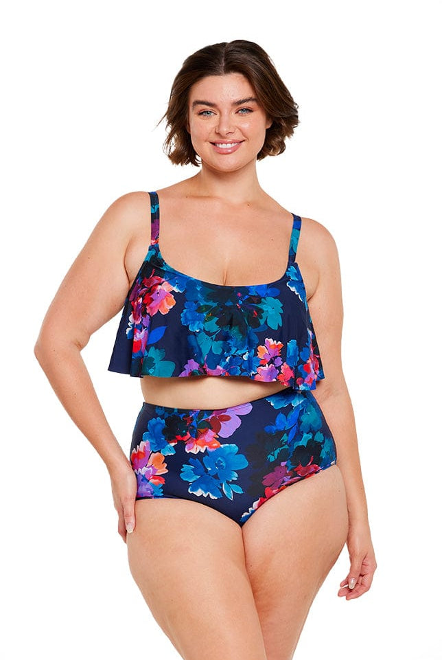 Brunette model wear navy floral frill bikini top and high waisted bottom