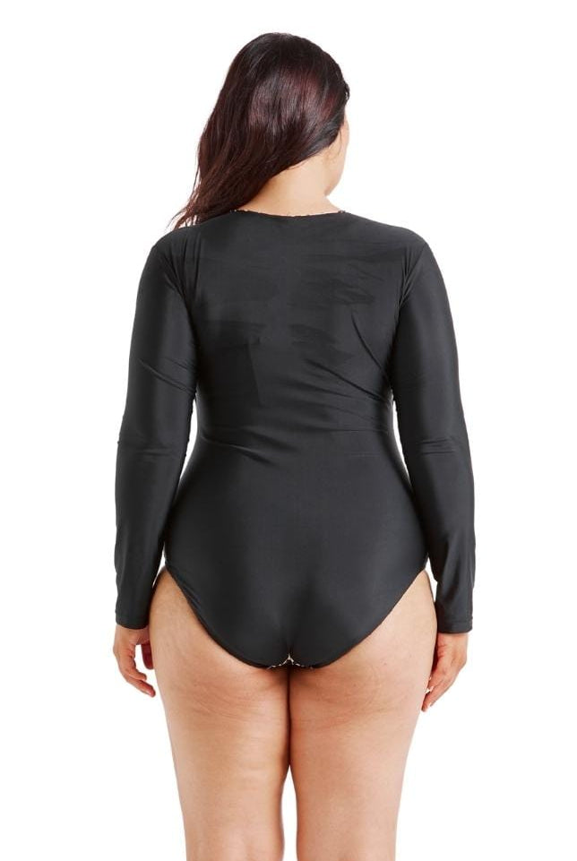 back of model wearing a long sleeve one piece swimwear