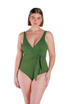 Model wearing olive green tie side one piece 