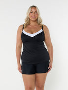 Blonde model wearing black textured underwire tankini
