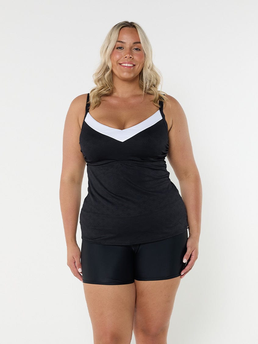 Blonde model wearing black textured underwire tankini
