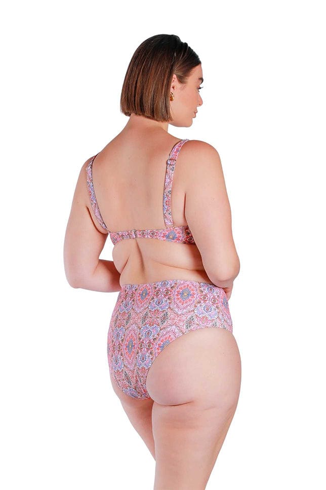 Model showing back of pink and red toned high waisted bikini bottoms