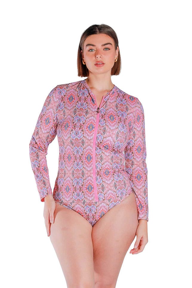 Front  Shot of model wearing the pink printed long sleeved rash vest 
