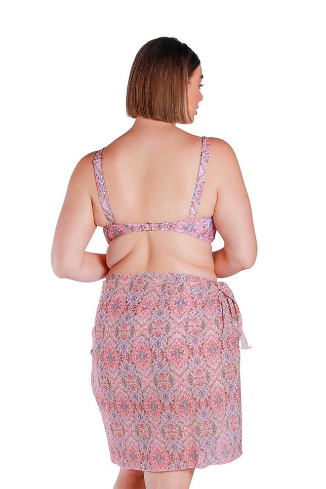Model wearing pink printed long tie side mesh swimming skirt