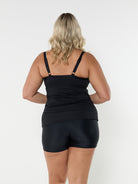 Back of blonde model in studio wearing textured underwire tankini top