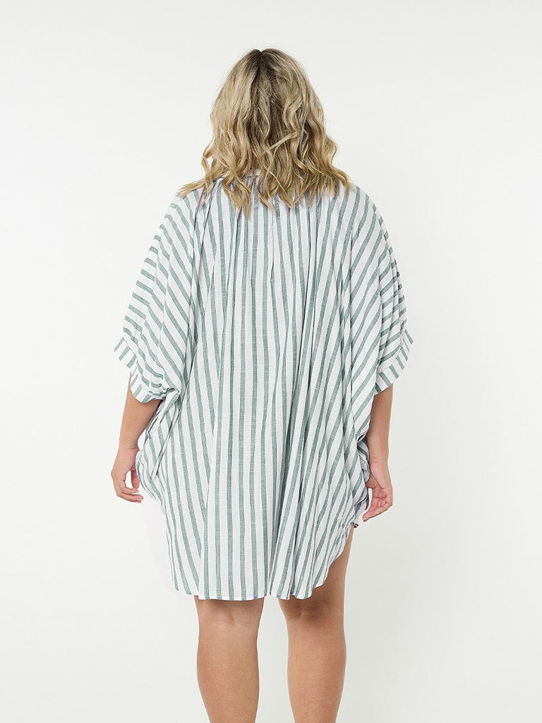 Model showing back beach dress coverup in green and white stripes