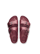 A pair of burgundy double-strap slide sandals with silver buckle details, shown from a top-down view on a white background.