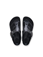 A pair of black  slide sandals shown from a top-down view on a clean white background.