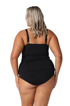 Model showing back of black floral tankini top
