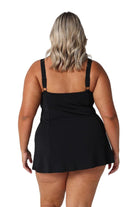 Model showing back of black chlorine resistant swim dress