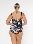 Blonde model shows back of chlorine resistant one piece swimsuit with removable straps