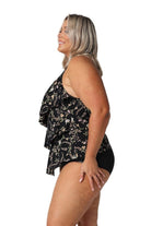 Model showing side of three tier ruffle tankini top