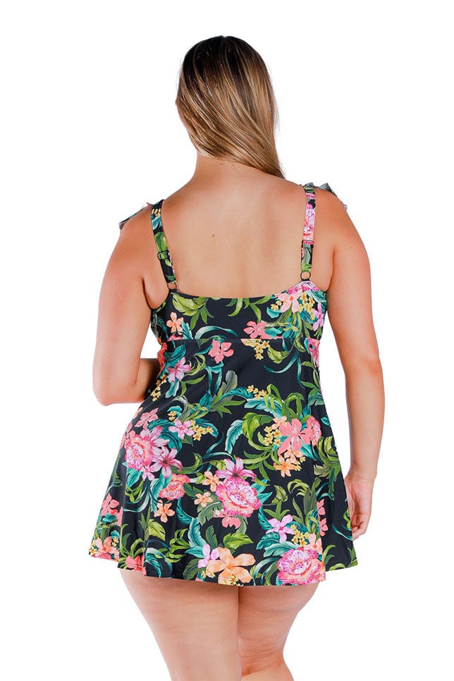 back of model wearing black pink and green floral swimming dress