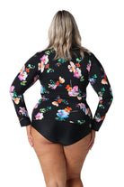 Model showing back of black with bright florals long sleeve rash vest