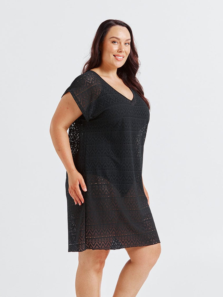 Model in studio wearing short sleeve mesh coverup dress in black