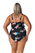 Model showing back of black floral one piece