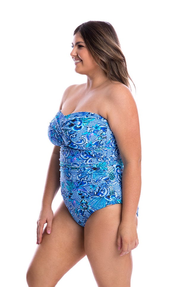 Model showing side of blue patterned one piece swimsuit