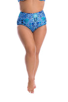 Model wearing blue high waisted swim bottoms